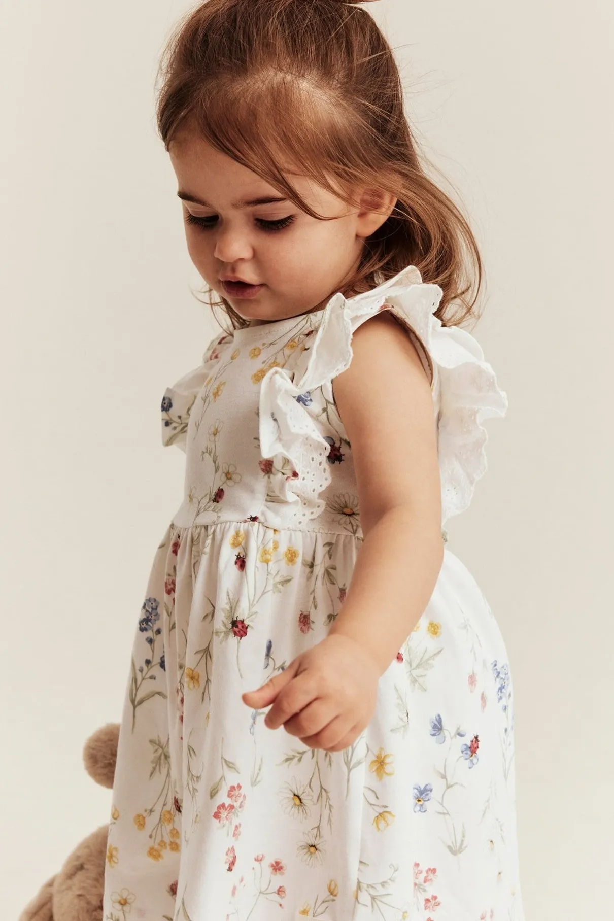 Baby white jersey dress with frill
