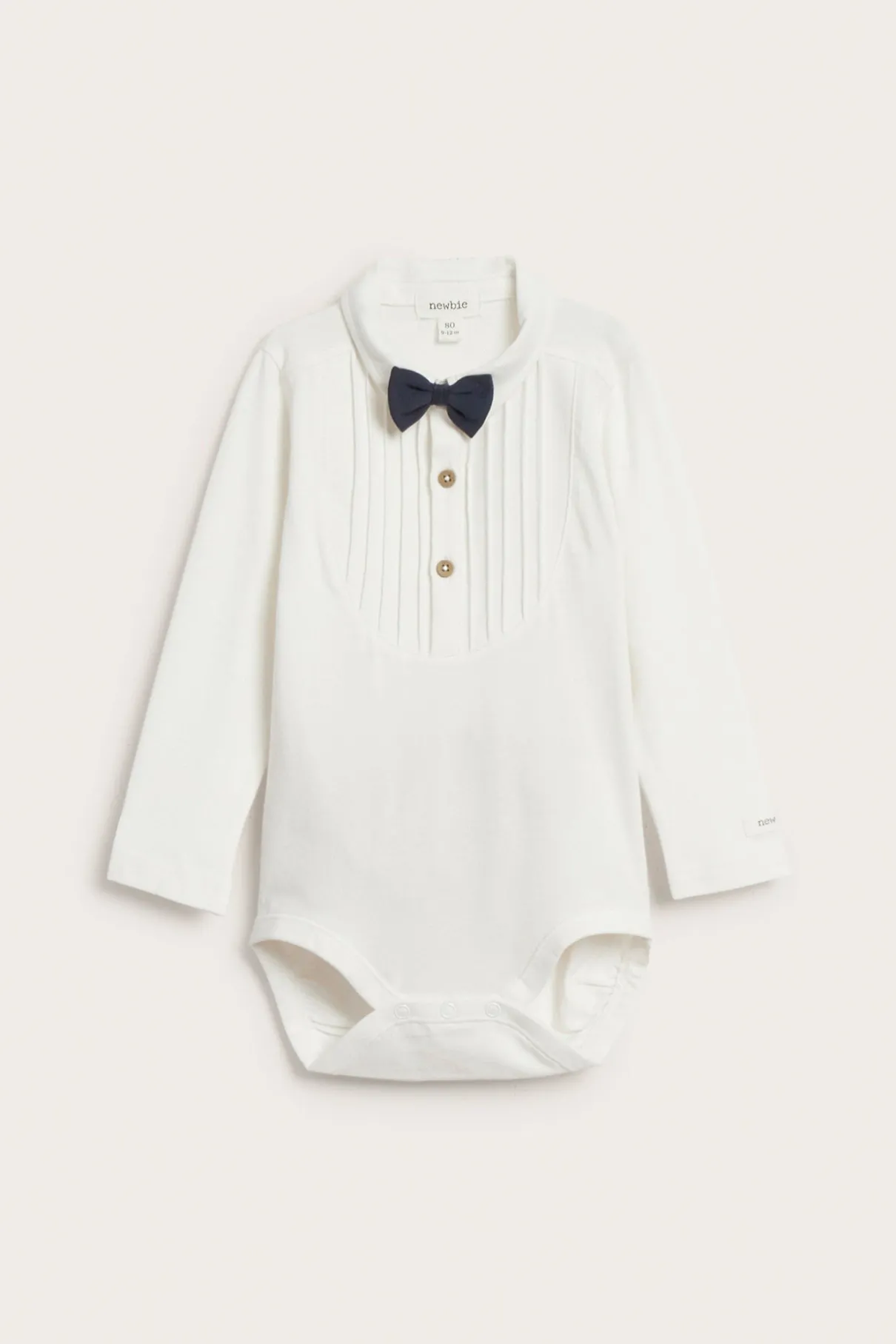 Baby white long-sleeved bodysuit with bow tie