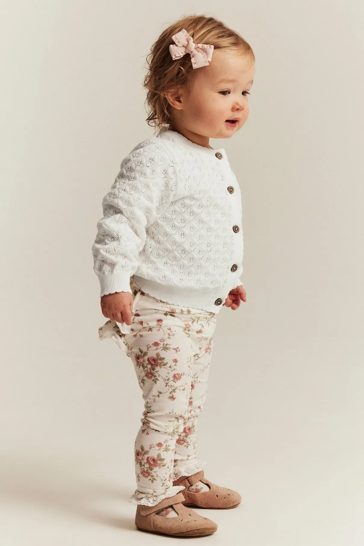 Baby white pattern‑knitted cardigan