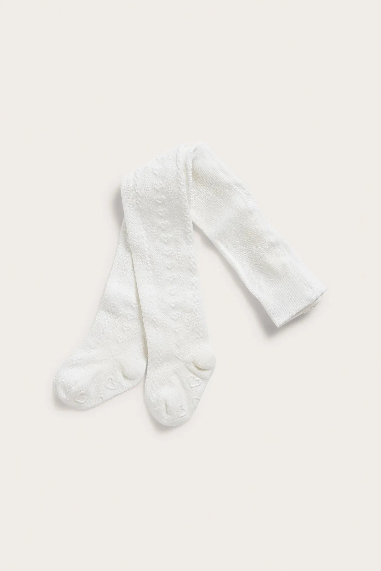 Baby white pattern-knit tights