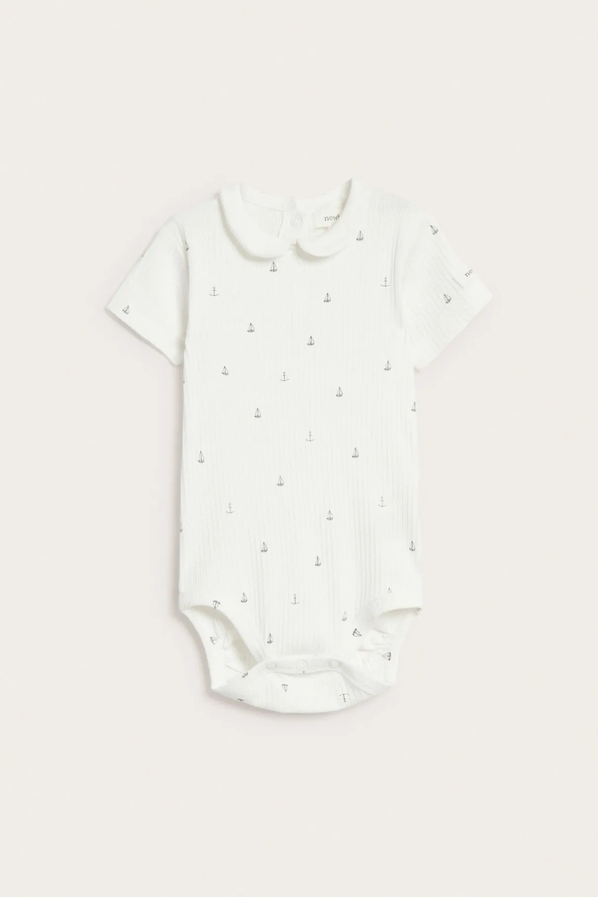 Baby white ribbed bodysuit with sailboats
