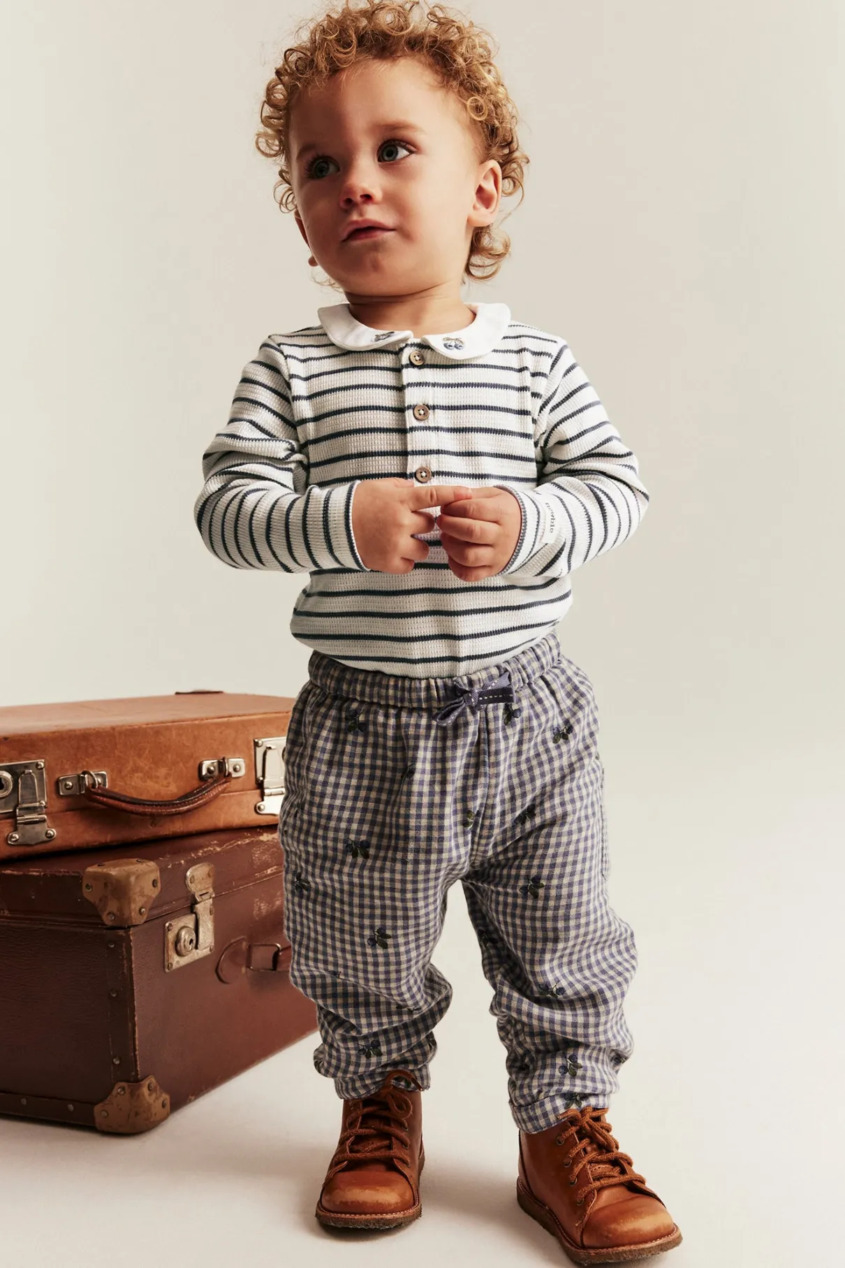 Baby white striped bodysuit with collar