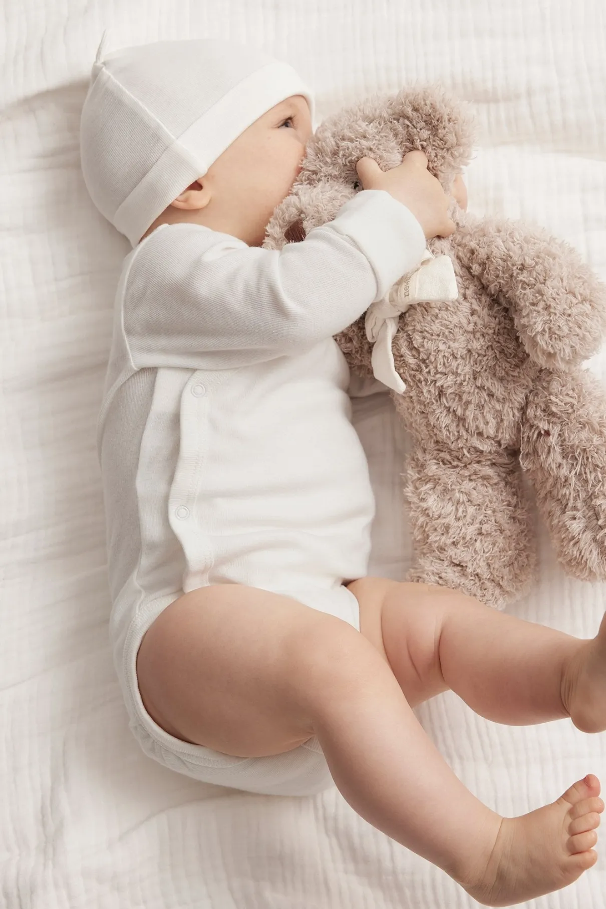Baby white wrap bodysuit
