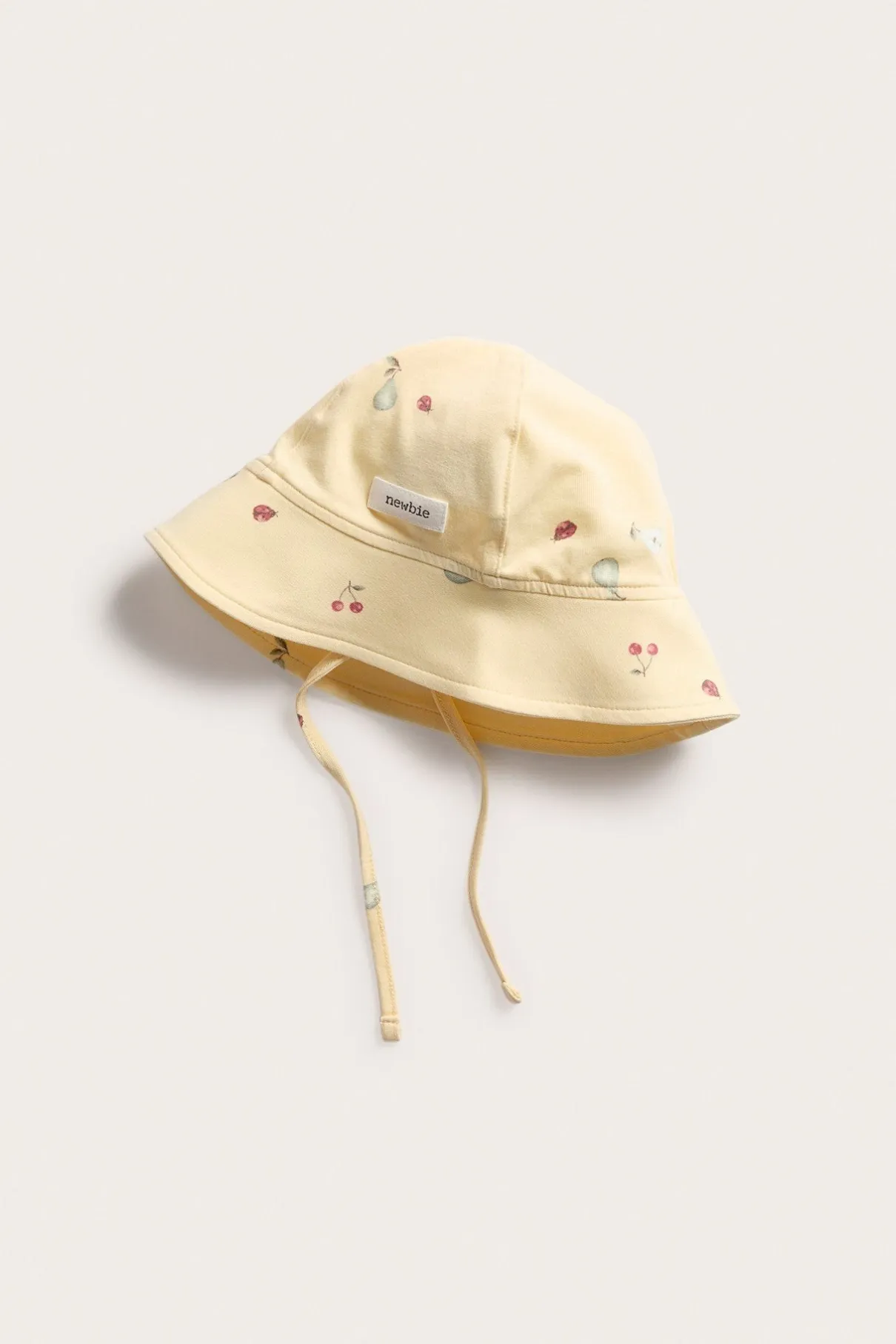 Baby yellow sun hat with ties