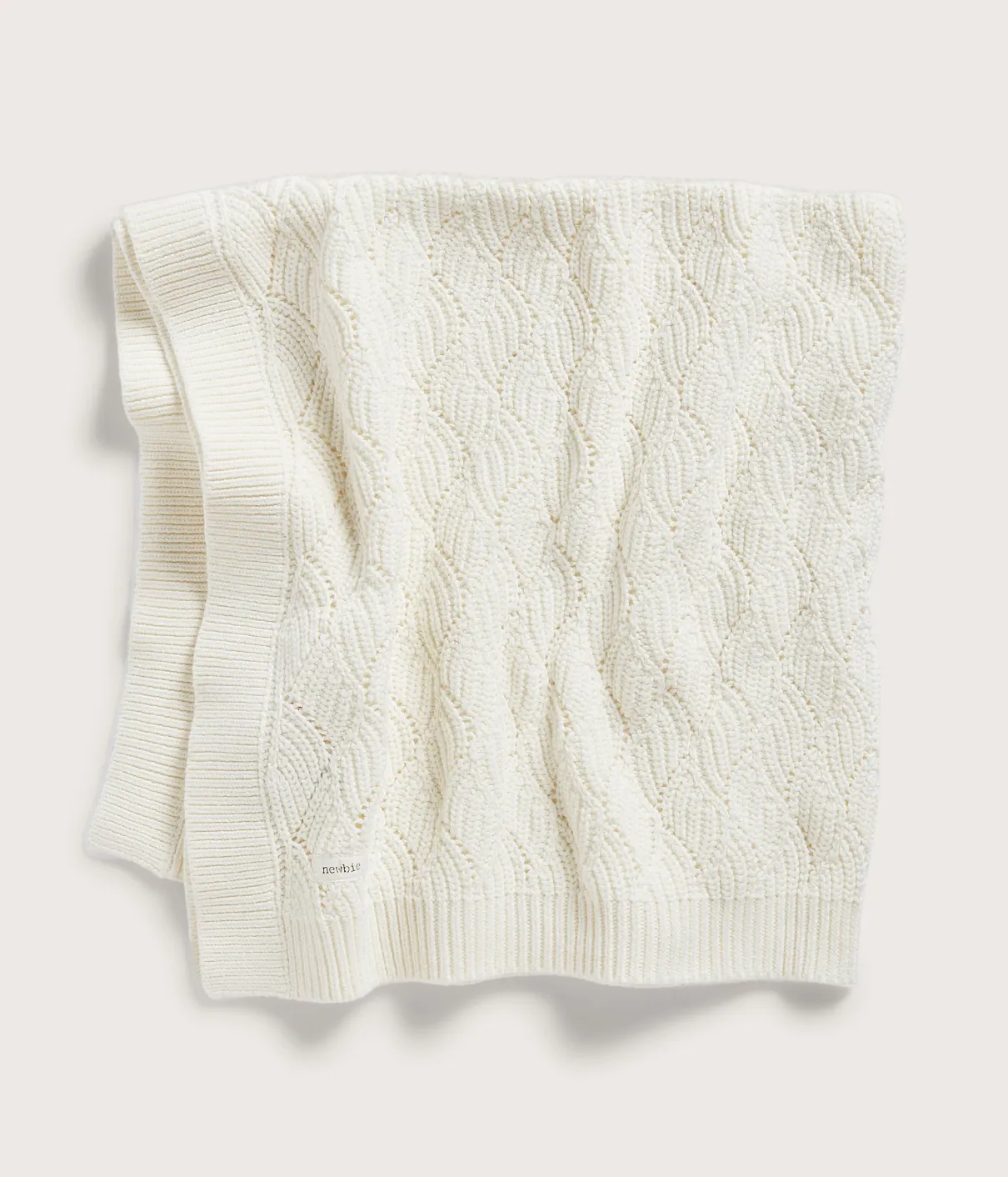 Beige pattern knitted blanket