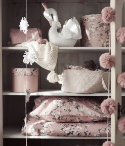 Beige quilted doll basket