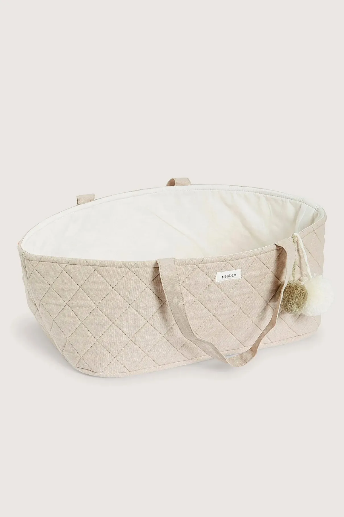 Beige quilted doll basket