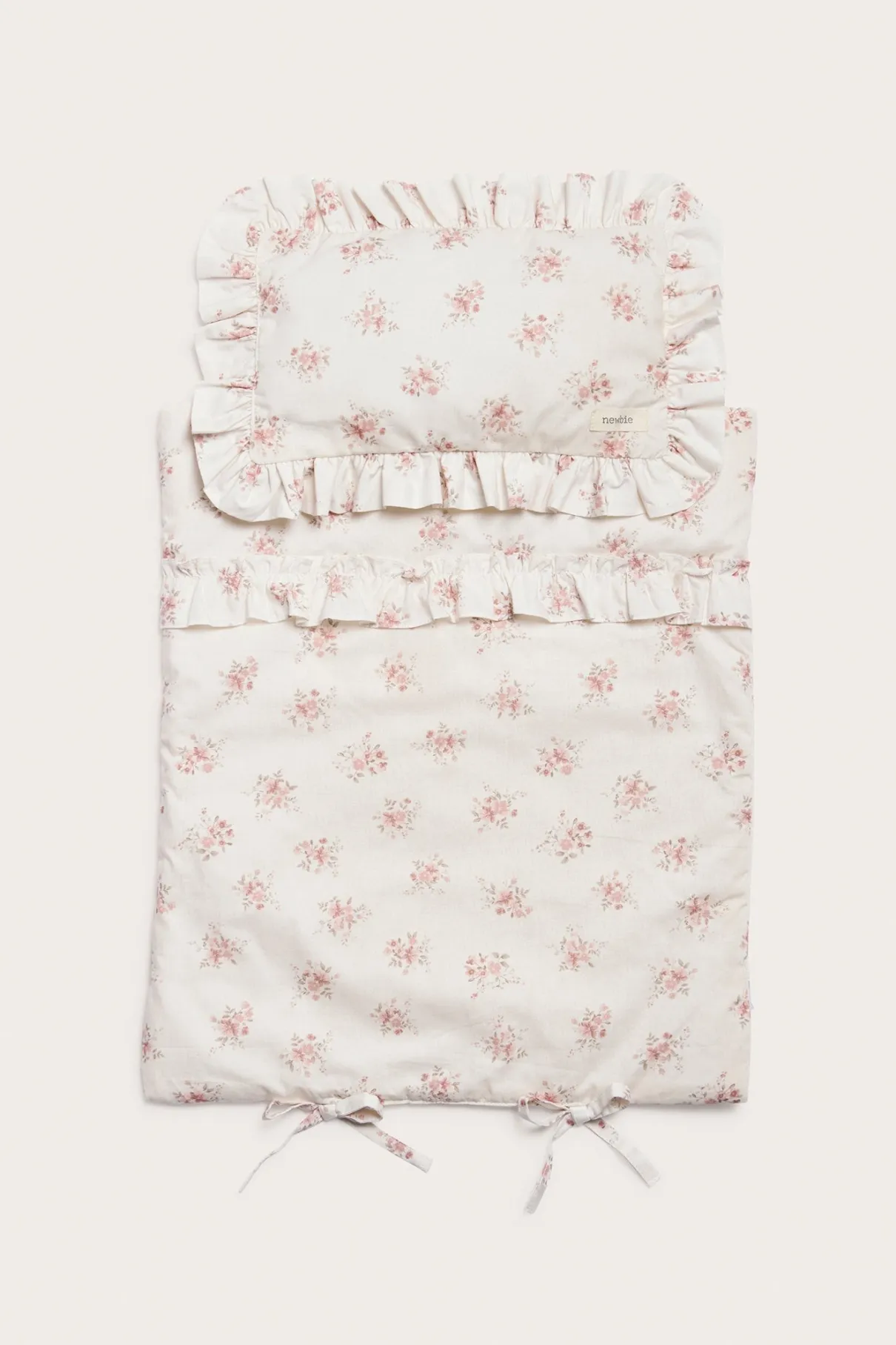 Floral bedding set for a doll bed
