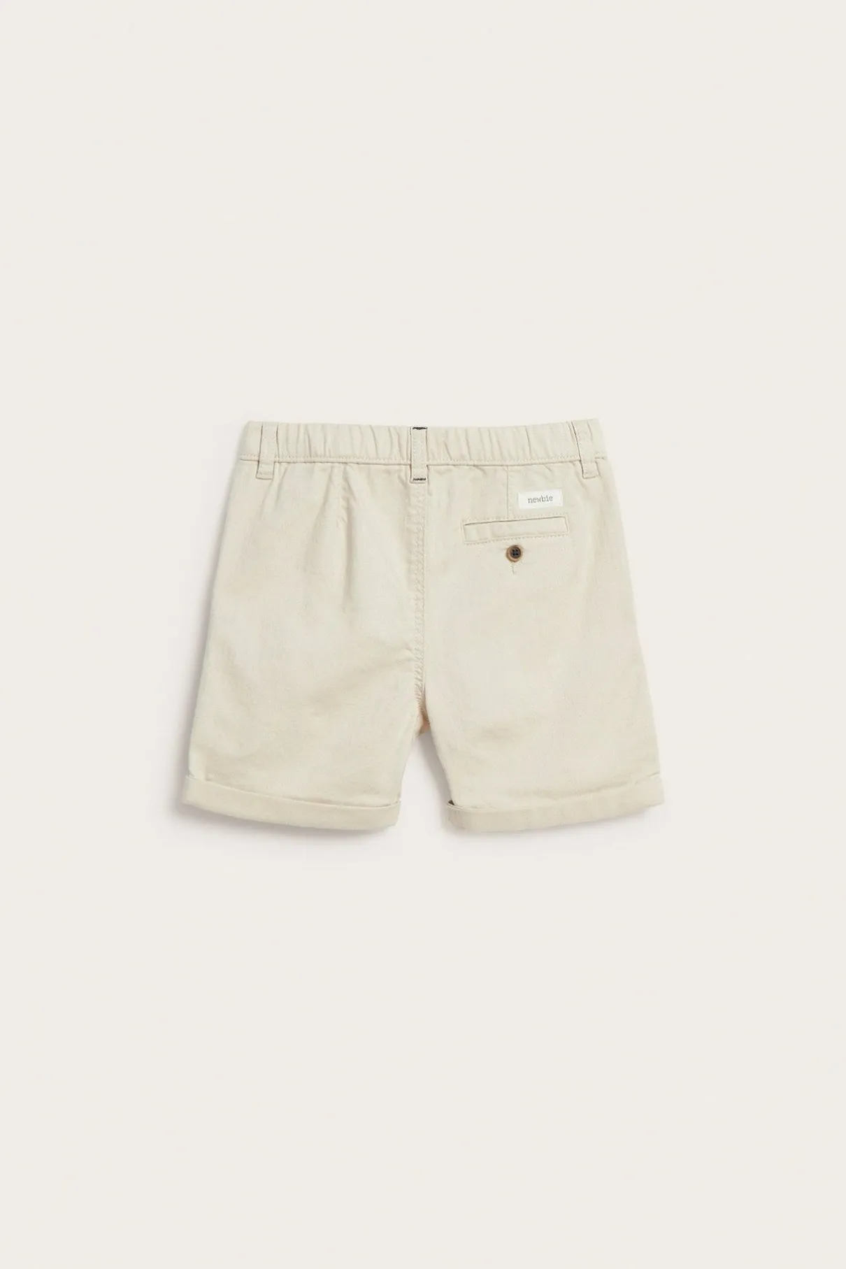 Kids beige woven shorts with pockets