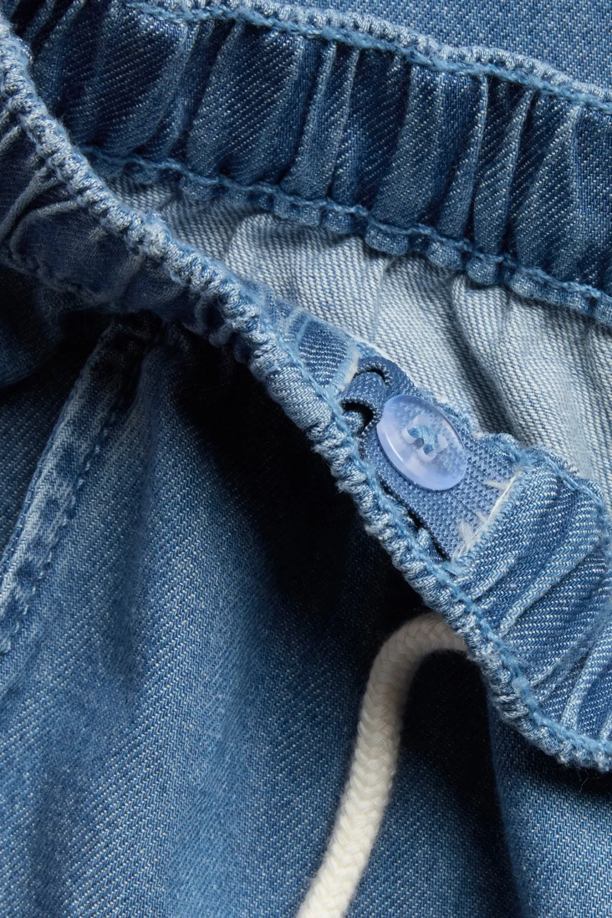 Kids blue denim trousers with drawstring
