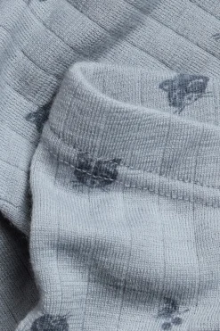 Kids´ blue merino wool leggings with raccoons