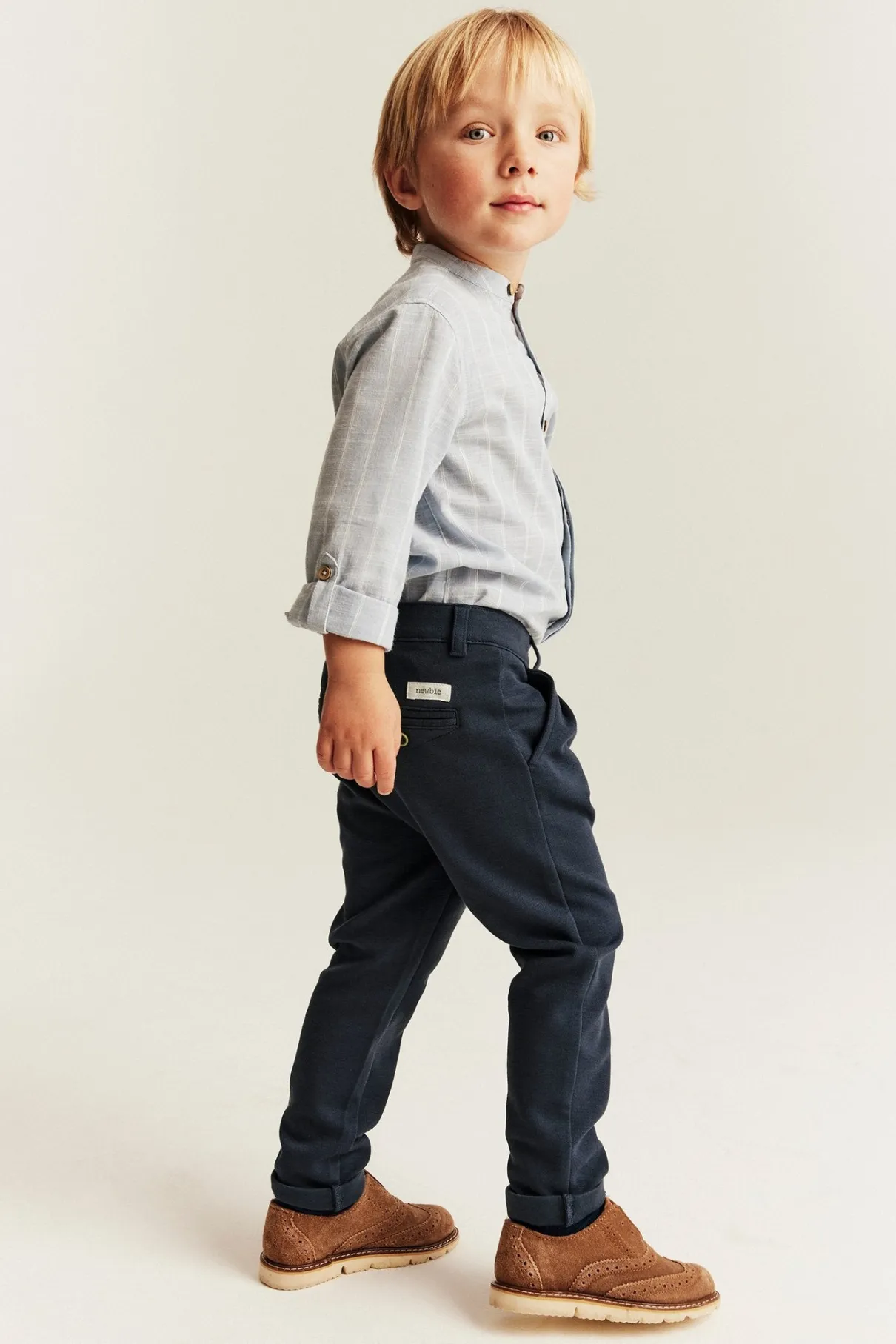 Kids blue trousers with button fastening