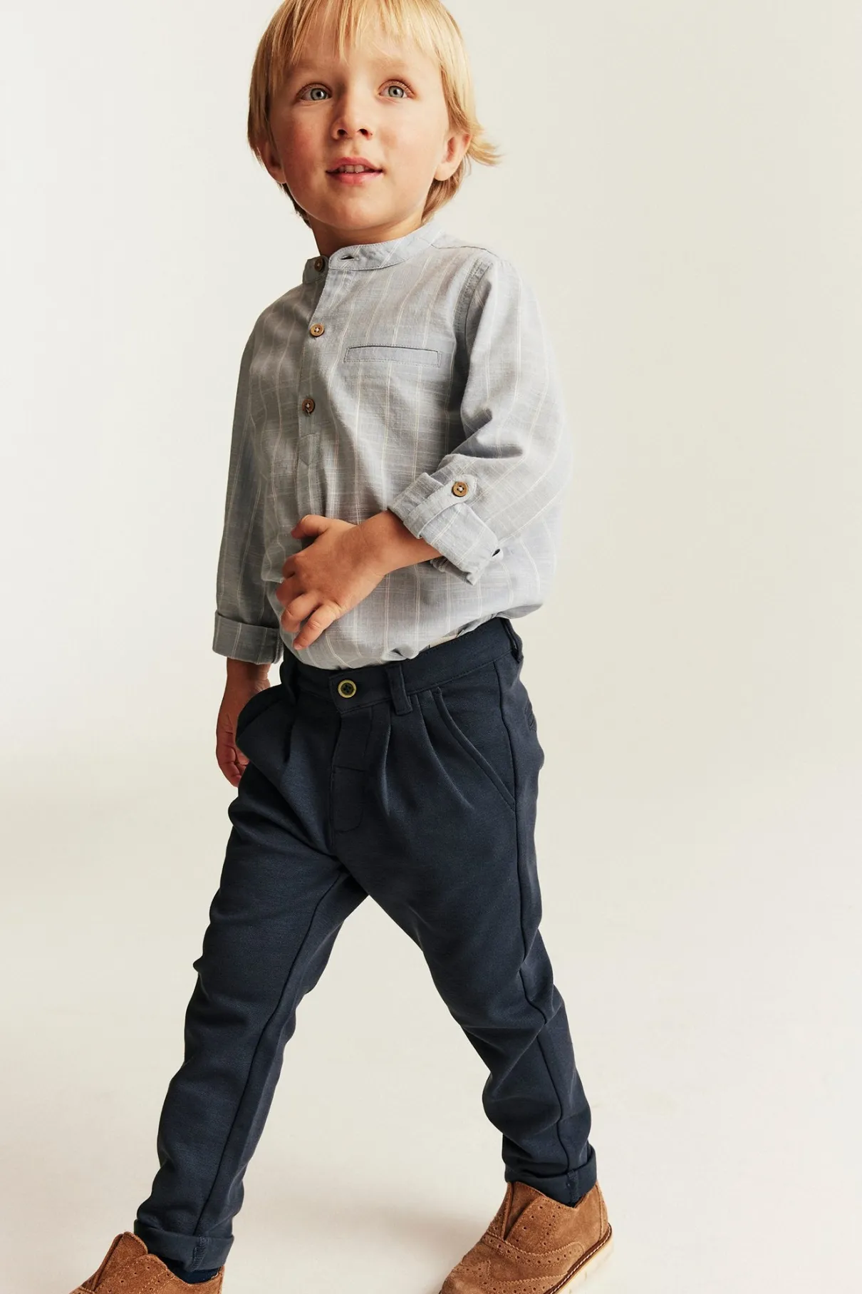 Kids blue trousers with button fastening