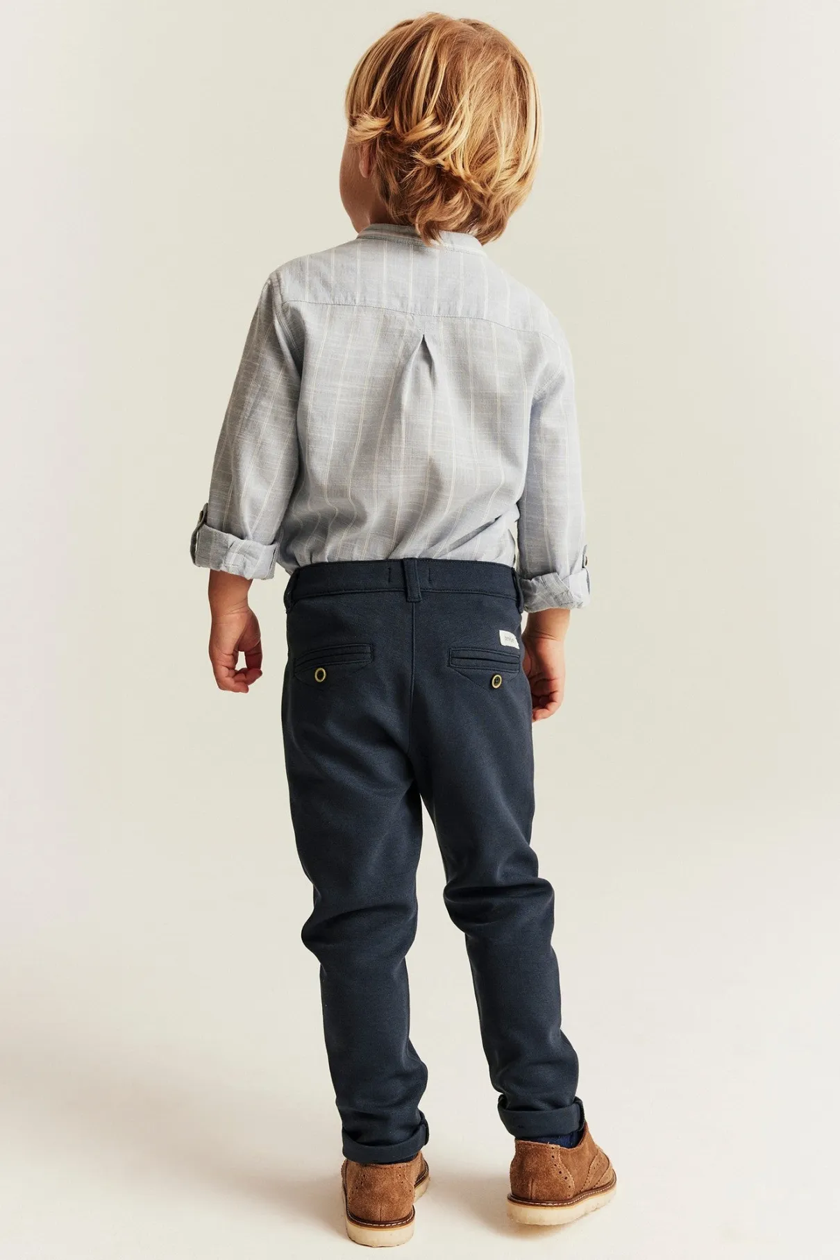 Kids blue trousers with button fastening