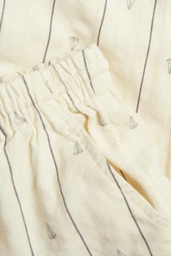Kids cream striped trousers with sailboats