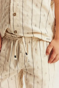Kids cream striped trousers with sailboats