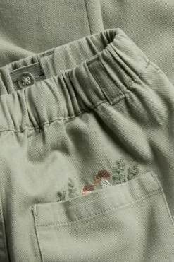 Kids green trousers with embroidery