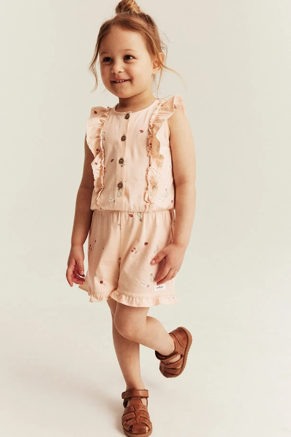 Kids orange jumpsuit with frills