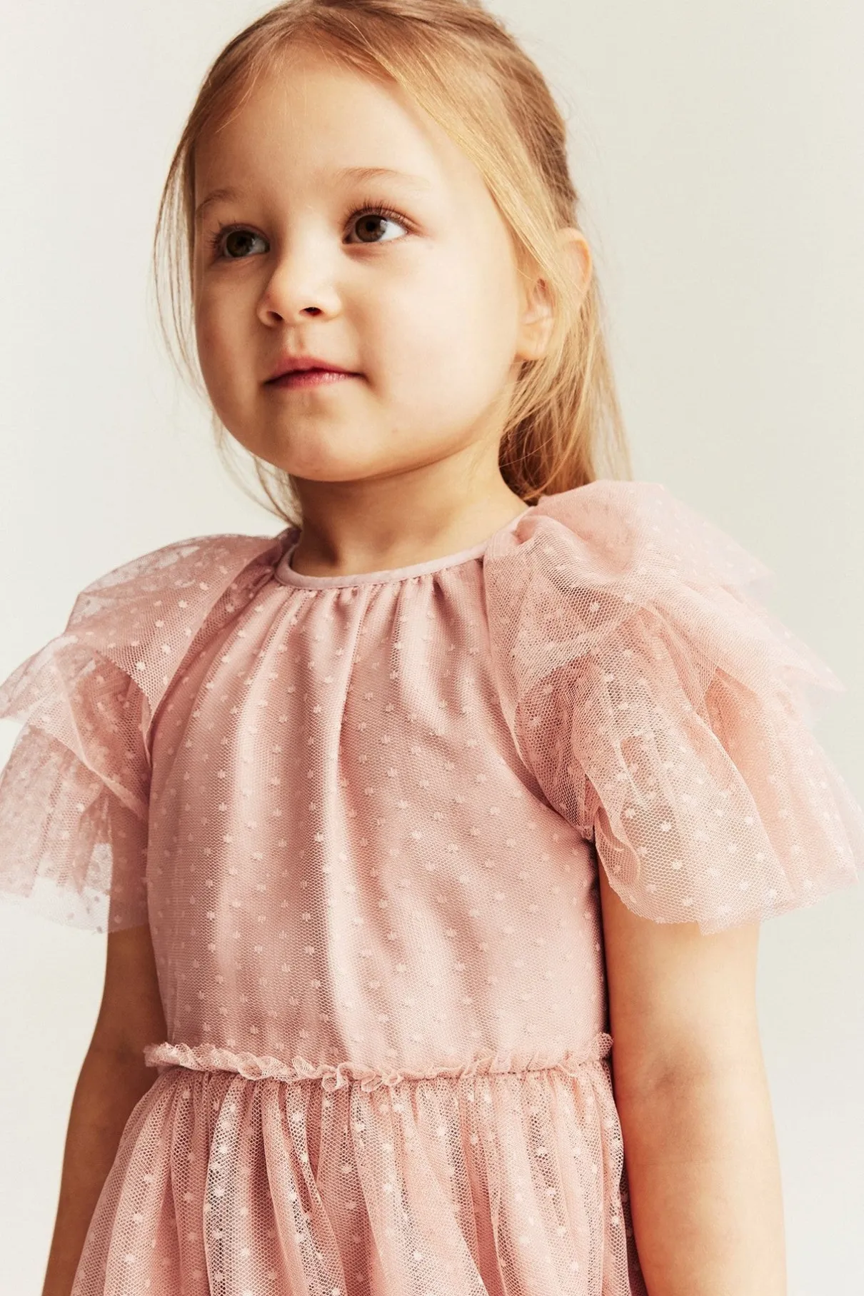 Kids pink mesh dress with ruffles