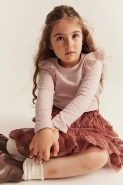 Kids' pink ribbed top with frills