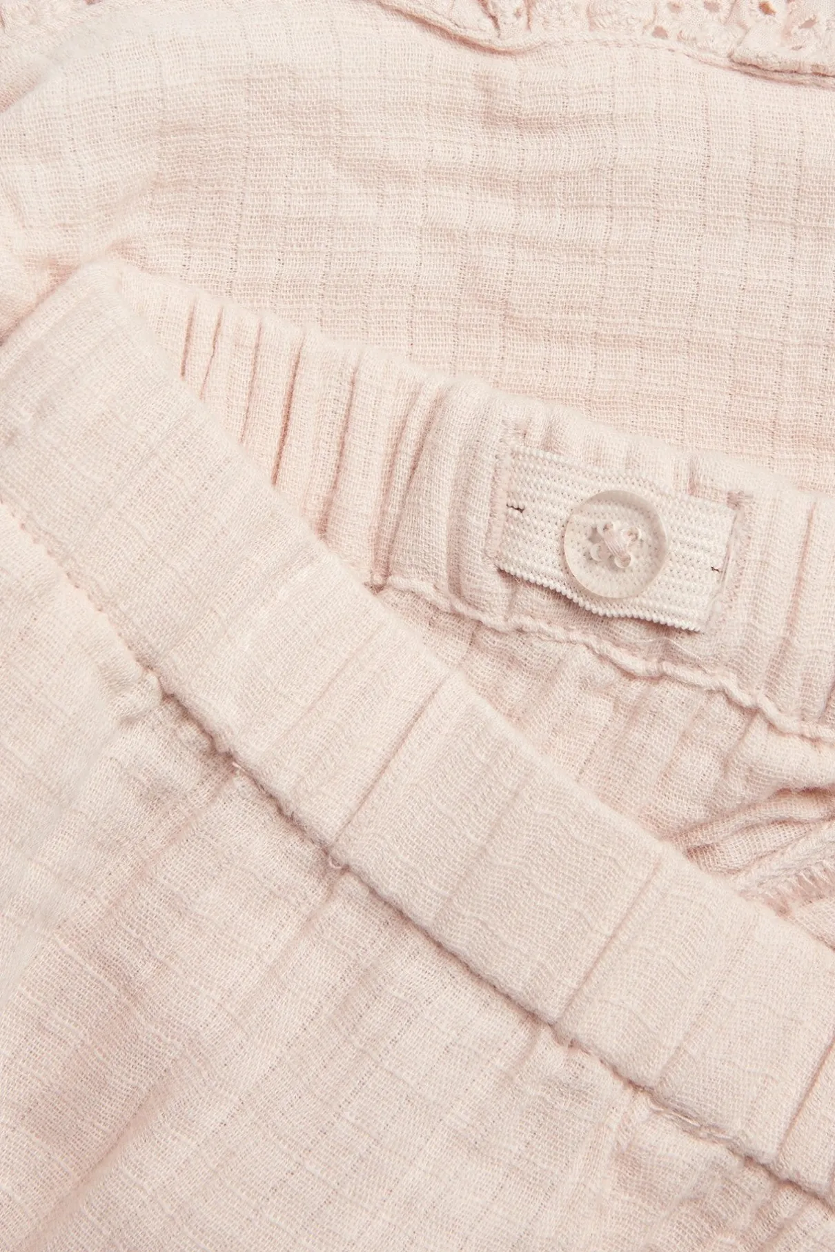 Kids pink woven shorts with frill