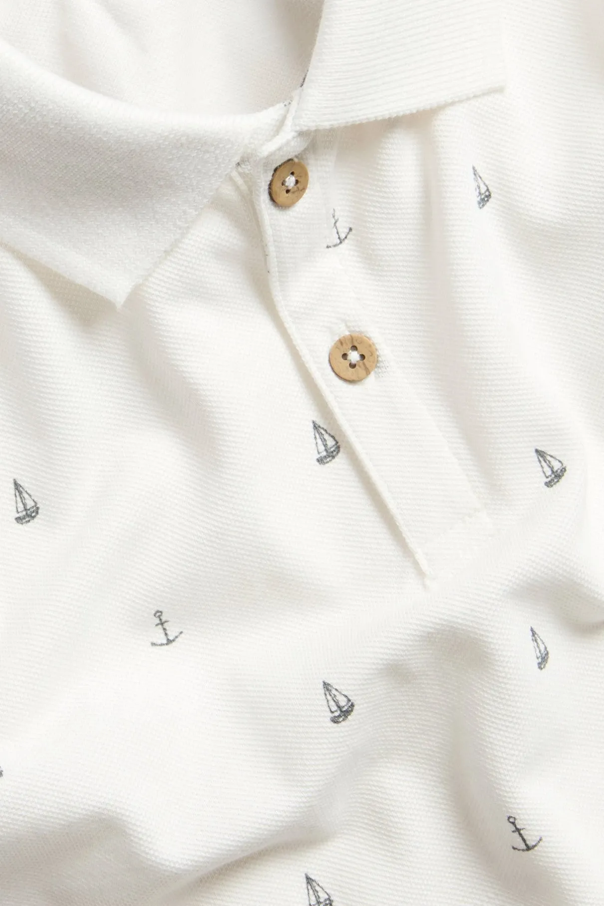 Kids short-sleeved polo shirt with sailboats