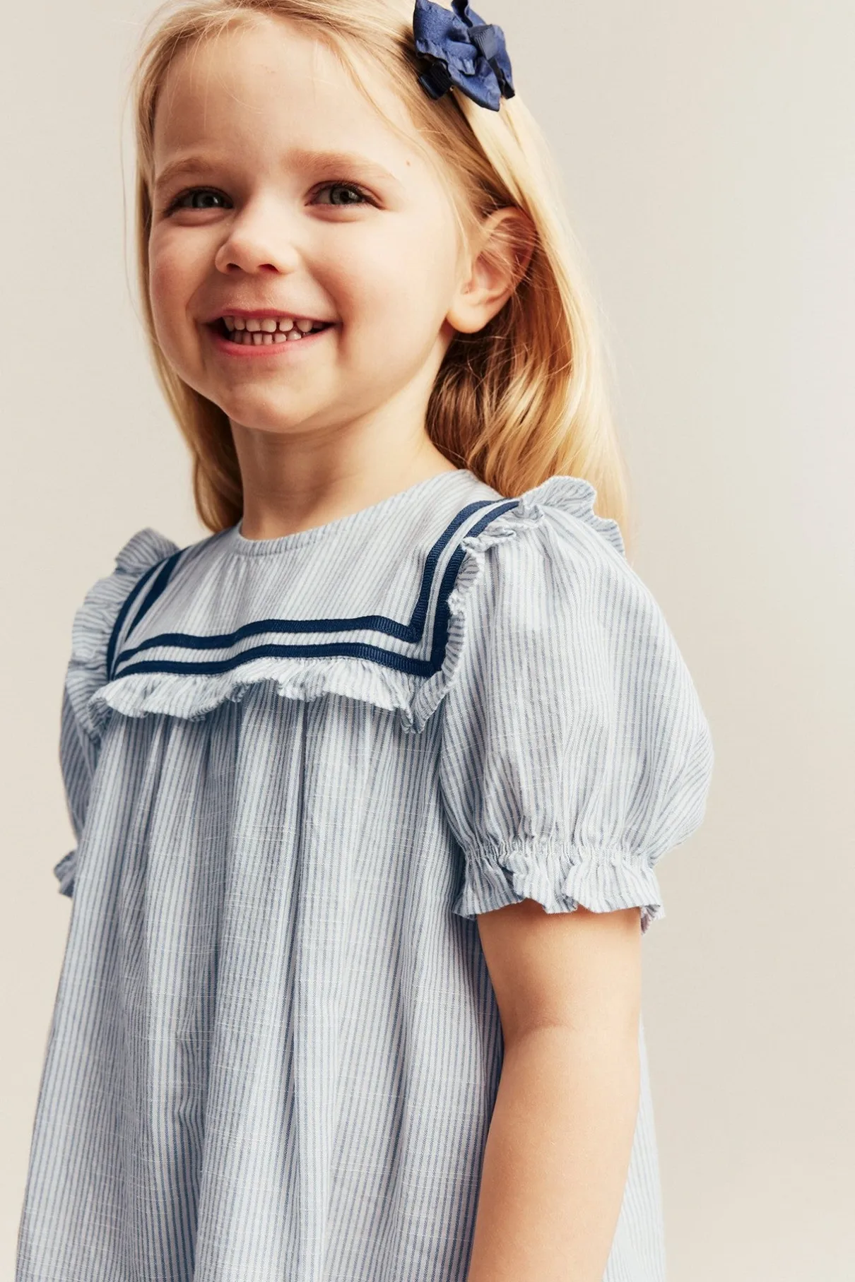 Kids striped dress with puff sleeves