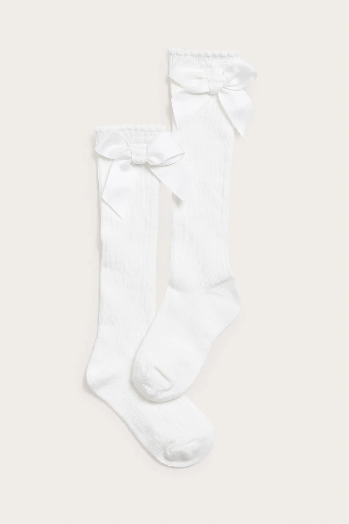 Kids white knee-high bow socks
