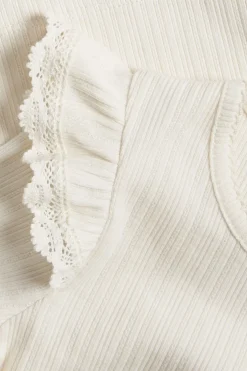 Kids white ribbed top with frills