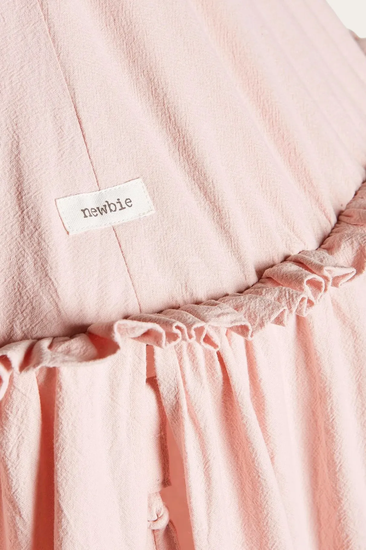 Pink reading tent with pom-poms