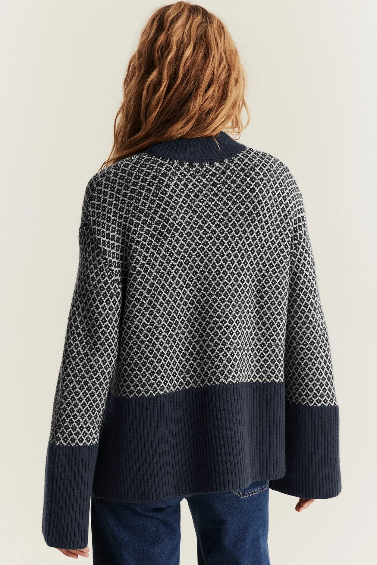 Women's blue knitted wool jumper
