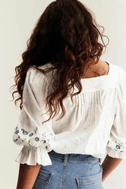 Women's white embroidered blouse