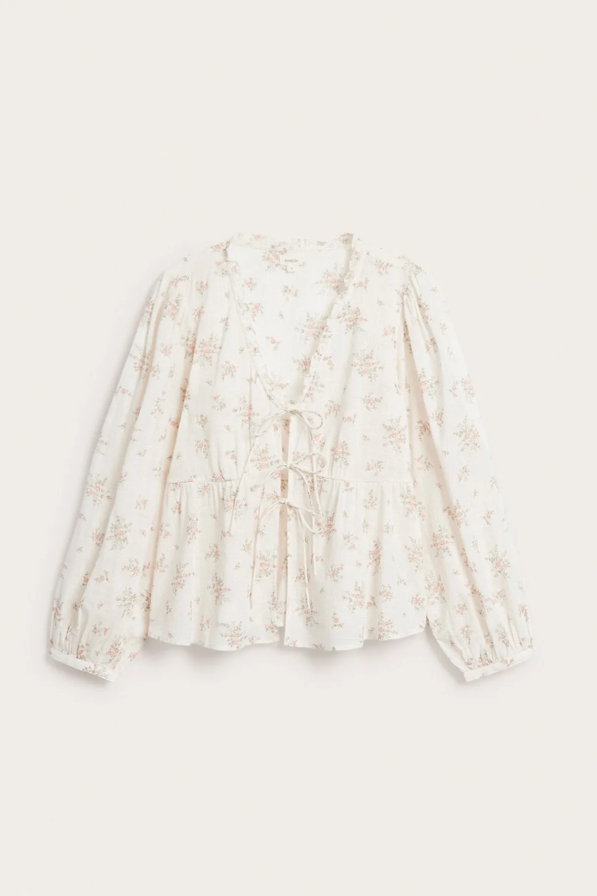 Women’s white floral blouse
